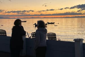 Birch Bay Washington - Two women standing on the beach at sunset