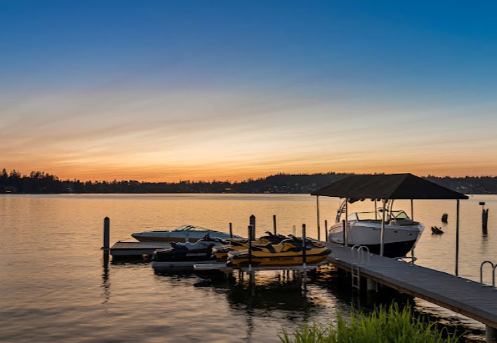 Boats tied to a Lake Whatcom homes deck